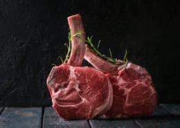 raw Black Angus tomahawk steaks