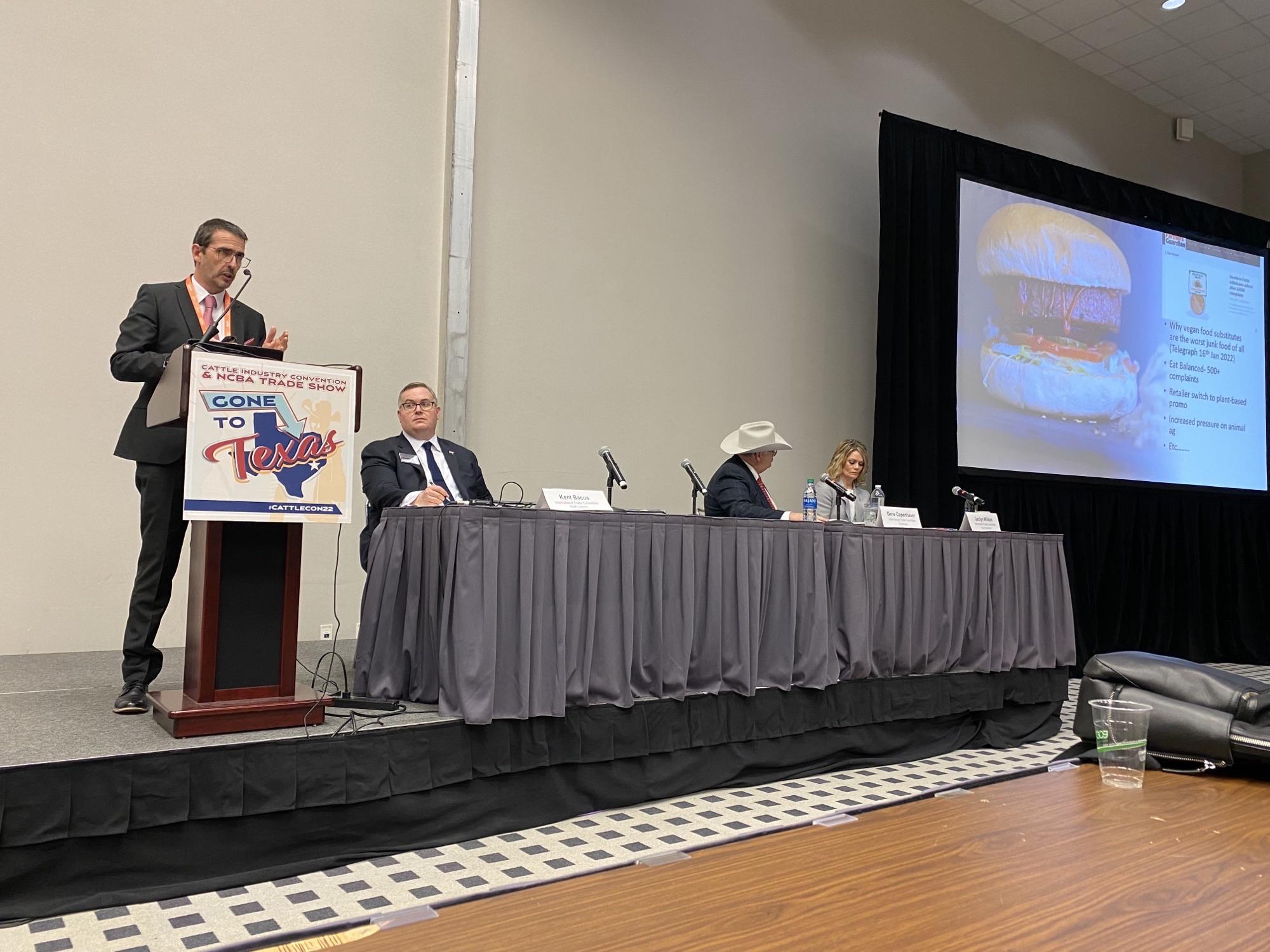 speaker panel at a cattle industry convention in Texas