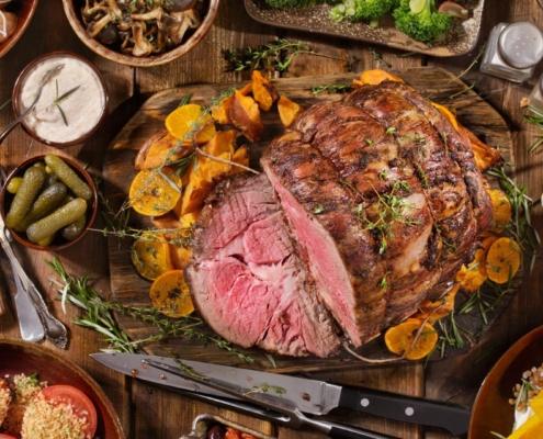 Thanksgiving roast beef and trimmings on a table