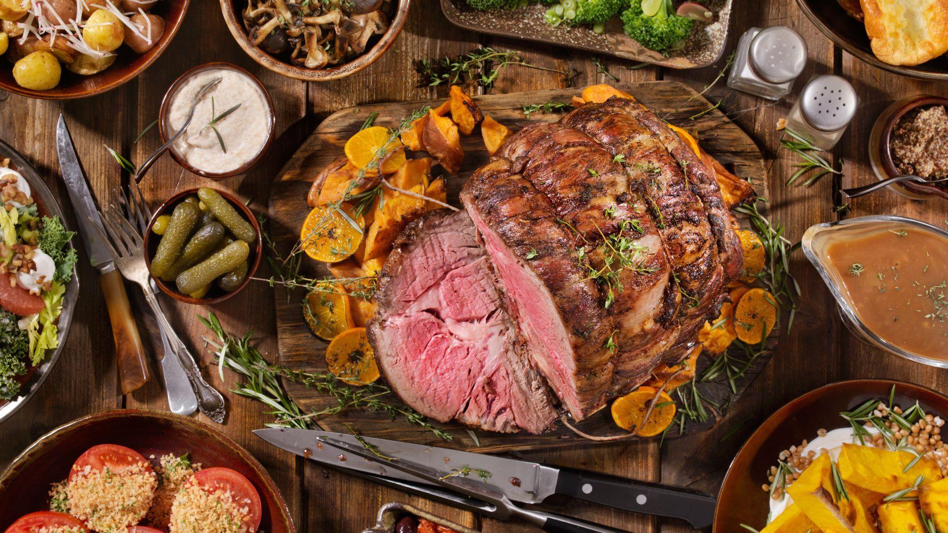 Thanksgiving roast beef and trimmings on a table